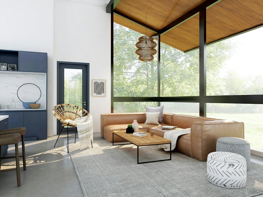 A warm, light-filled living room with a leather sofa
